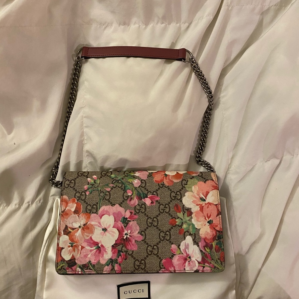 - Gucci Blooms GG Print clutch bag